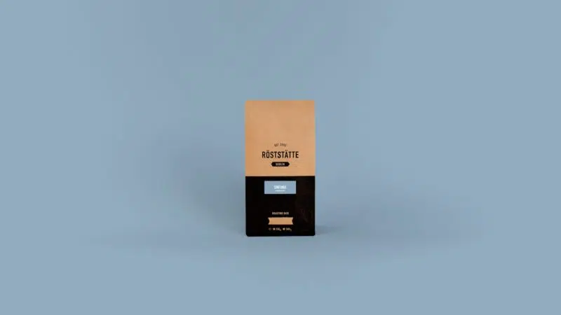 Arabica Espresso Blend: Unser Bestseller Sinfonia vor blauem Hintergrund.