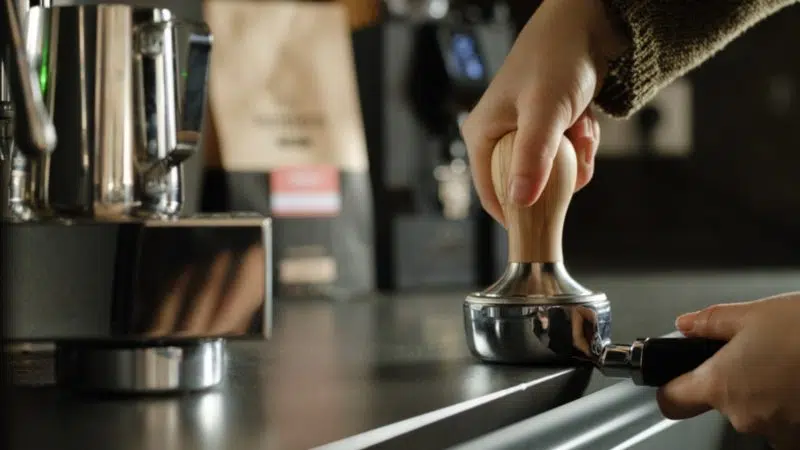 Barista Basic training Berlin: tamping in action.